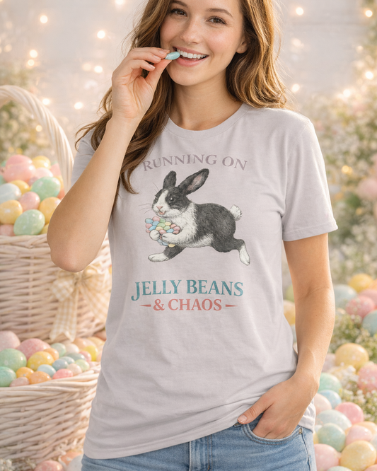 Woman wearing a t-shirt with a bunny graphic and text that says Running on Jelly Beans & Chaos, surrounded by Easter eggs and a basket.