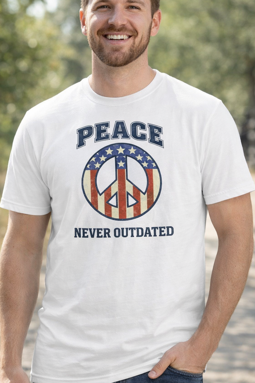 man wearing a graphic t-shirt that says peace never outdated with the peace symbol