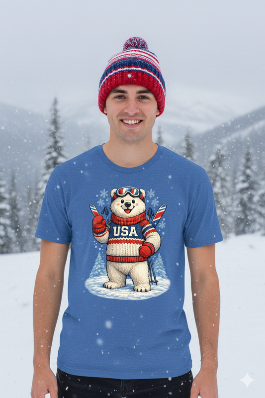 Person wearing a blue t-shirt with a polar bear graphic in a snowy landscape