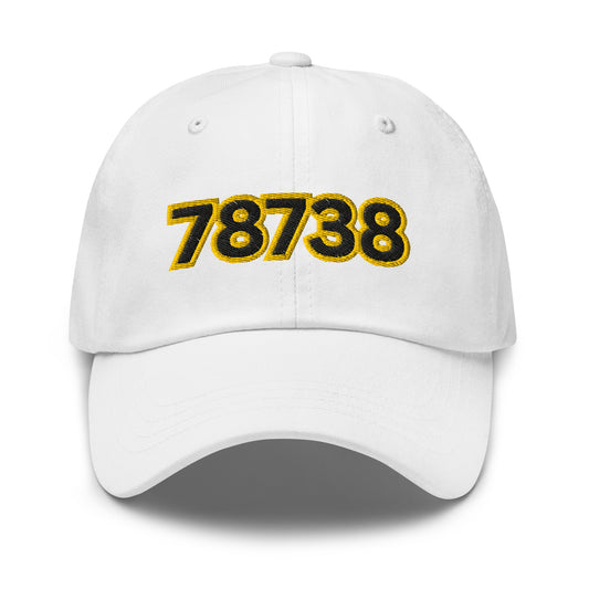White dad baseball hat with black and yellow numbers '78738' on a white background and bee on back