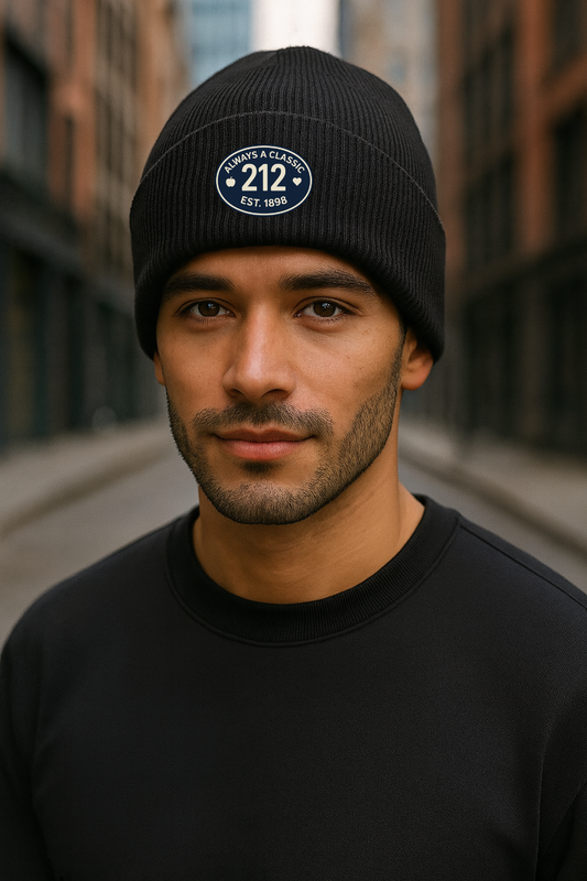 Man wearing a black beanie with a 212  logo in an urban setting