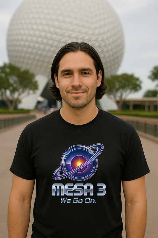 Man wearing a black t-shirt with a Mesa 3 graphic design in front of a the Epcot Ball.