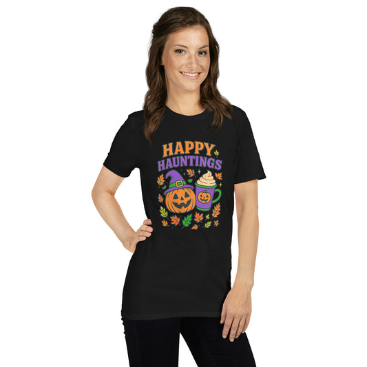 Lady in black shirt with Happy Hauntings and jack'o lantern and pumpkin spice mug of hot drink.