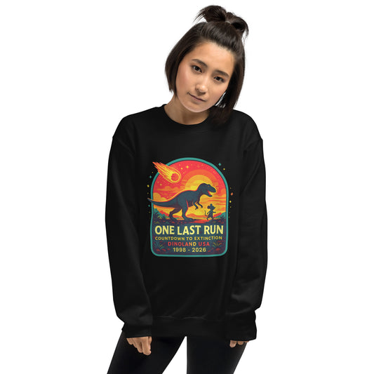 Women in black sweatshirt that has dinosaur taking one last run.