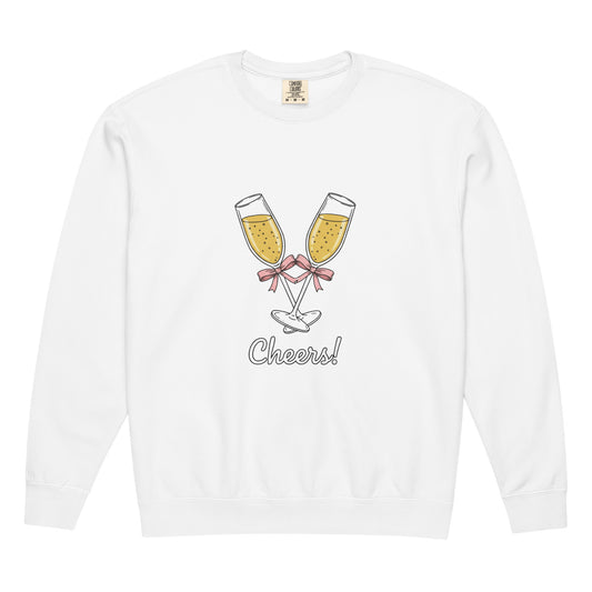 White long-sleeve shirt with champagne glass design and 'Cheers!' text on a white background